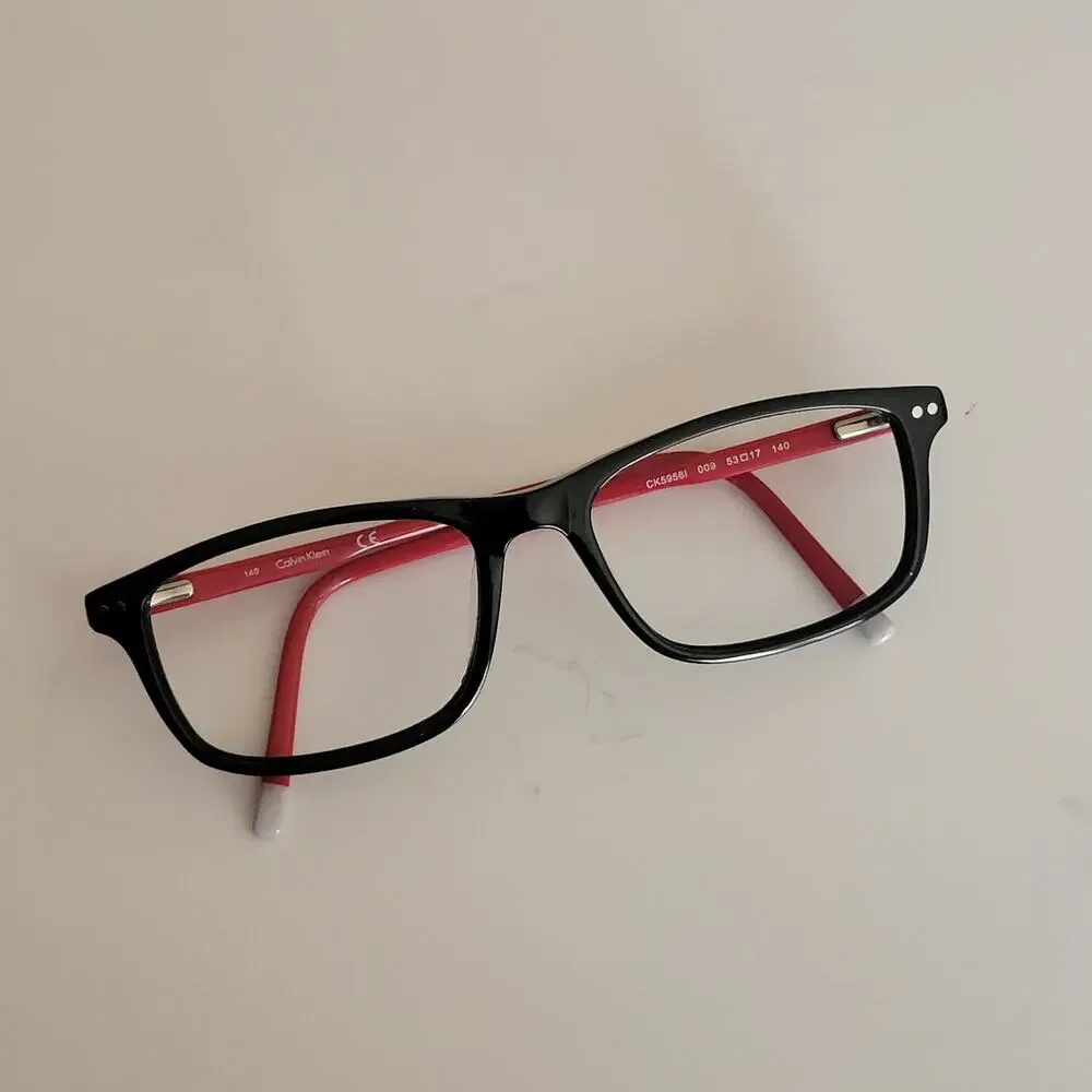 Calvin Klein CK59561 model featuring a black and red frame design 53X17X140